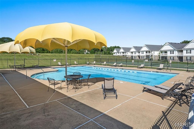 160 Brandy Mill Cir Unit 7C, High Ridge, MO 63049 - community pool with a patio and a residential view