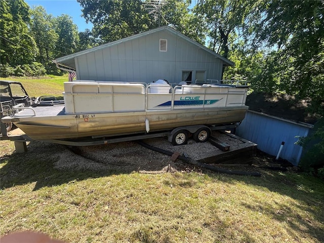 194 Craft Subdivision Rds, Greenville, MO 63944 - back of house featuring a lawn and board and batten siding