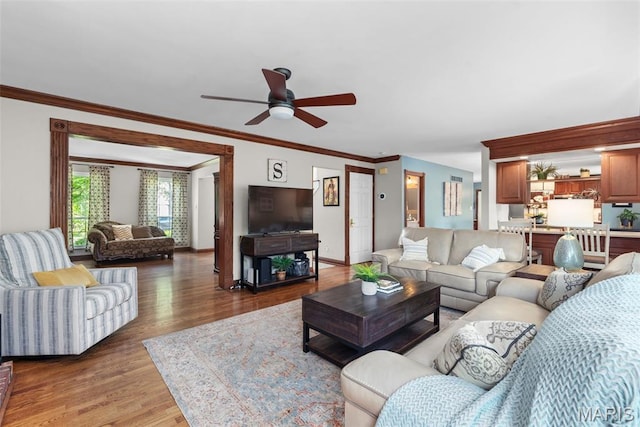 2854 Championship Blvd, Saint Louis, MO 63129 - living area with ceiling fan, wood finished floors, ornamental molding, and baseboards
