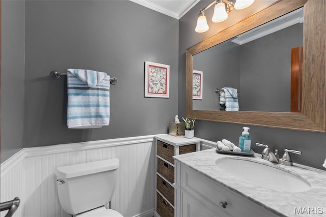 2854 Championship Blvd, Saint Louis, MO 63129 - bathroom featuring crown molding, toilet, wainscoting, and vanity