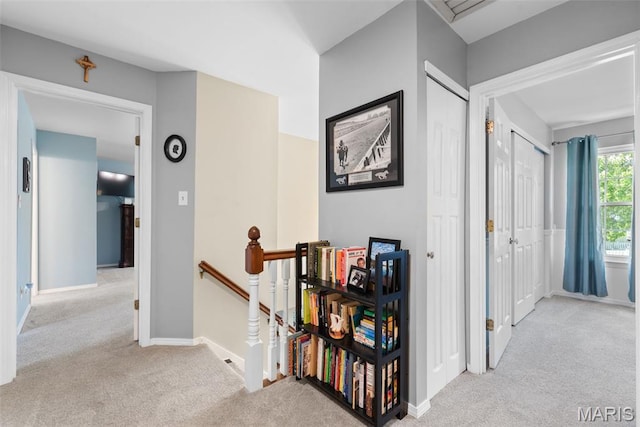 2854 Championship Blvd, Saint Louis, MO 63129 - corridor with an upstairs landing, carpet floors, and baseboards