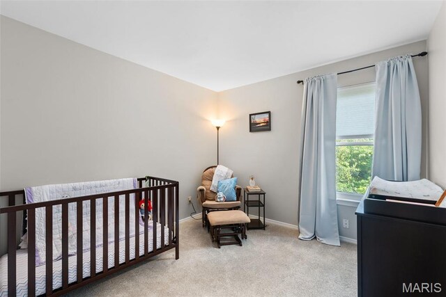 2854 Championship Blvd, Saint Louis, MO 63129 - bedroom with a nursery area, carpet floors, and baseboards