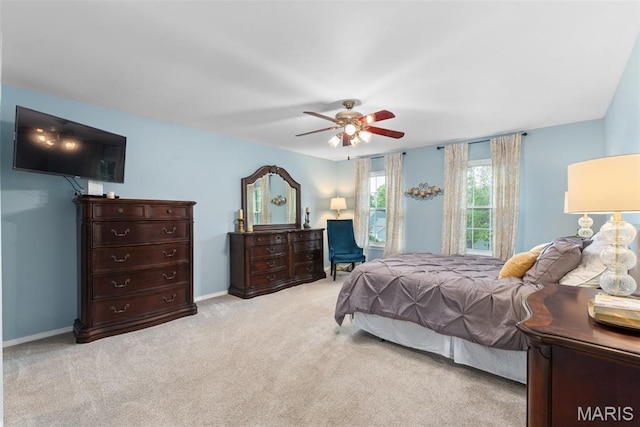 2854 Championship Blvd, Saint Louis, MO 63129 - bedroom with light colored carpet, baseboards, and a ceiling fan