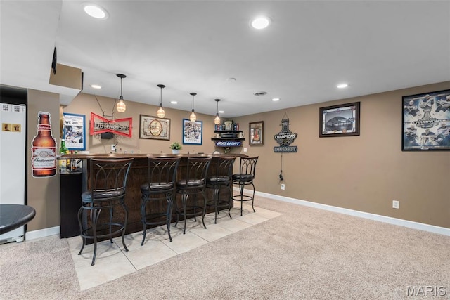 2854 Championship Blvd, Saint Louis, MO 63129 - indoor bar with recessed lighting, light colored carpet, baseboards, and pendant lighting