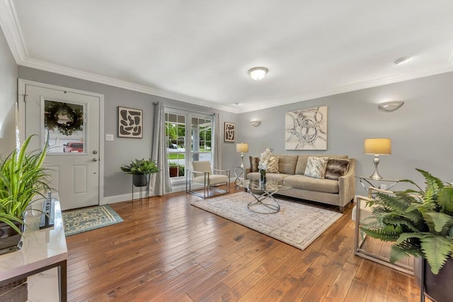 1354 Nutmeg Dr, Saint Charles, MO 63303 - living room featuring hardwood / wood-style floors, ornamental molding, and baseboards