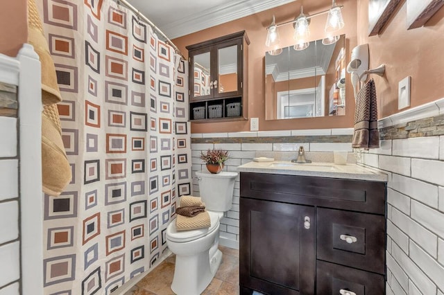 1354 Nutmeg Dr, Saint Charles, MO 63303 - bathroom with toilet, ornamental molding, vanity, a shower with curtain, and tile walls