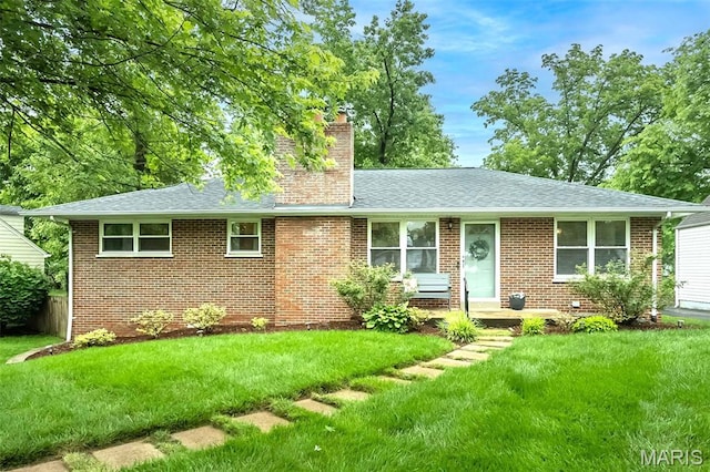 7 Frederick Ln, Saint Louis, MO 63122 - view of front of home with a chimney, a front lawn, brick siding, and roof with shingles