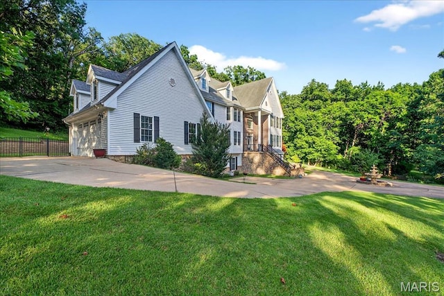 125 Park Lawn Est, Fenton, MO 63026 - view of home's exterior featuring a garage and concrete driveway