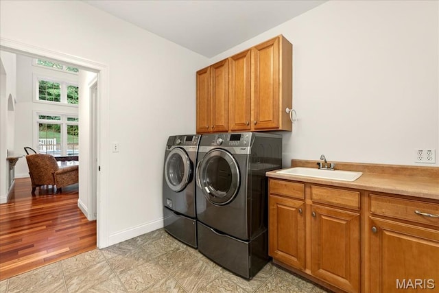 125 Park Lawn Est, Fenton, MO 63026 - washroom featuring independent washer and dryer and cabinet space