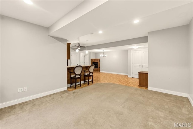 125 Park Lawn Est, Fenton, MO 63026 - below grade area featuring light carpet, recessed lighting, and a ceiling fan