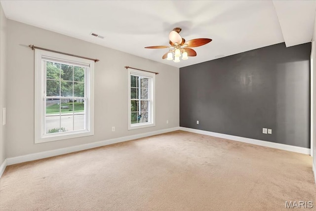 125 Park Lawn Est, Fenton, MO 63026 - spare room featuring light colored carpet and a ceiling fan