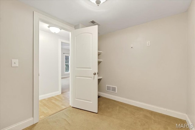 125 Park Lawn Est, Fenton, MO 63026 - unfurnished bedroom with light colored carpet and baseboards