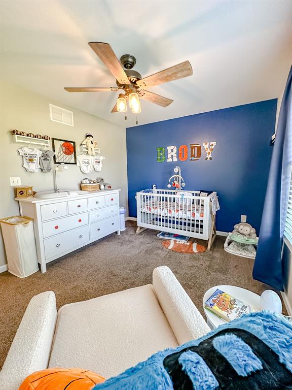 20083 Southview Dr, Carlyle, IL 62231 - bedroom with carpet, a ceiling fan, and baseboards