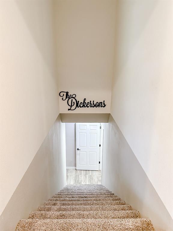 20083 Southview Dr, Carlyle, IL 62231 - stairway featuring a towering ceiling and wood finished floors