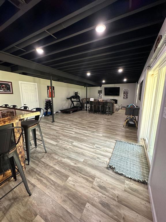 20083 Southview Dr, Carlyle, IL 62231 - recreation room with wood finished floors and bar