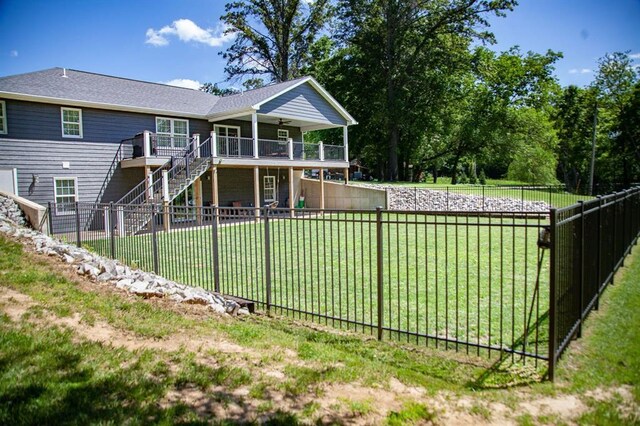 20083 Southview Dr, Carlyle, IL 62231 - back of property featuring stairs, a deck, a ceiling fan, and a shingled roof