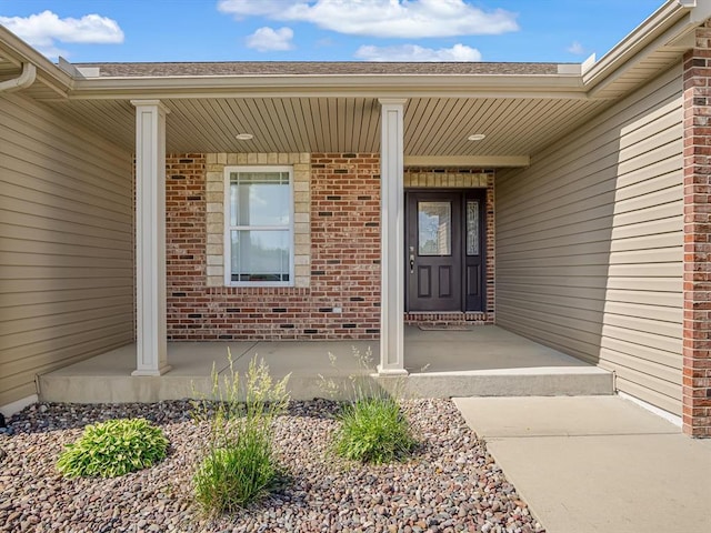 1051 Creekside Dr, Waterloo, IL 62298 - property entrance featuring covered porch and brick siding