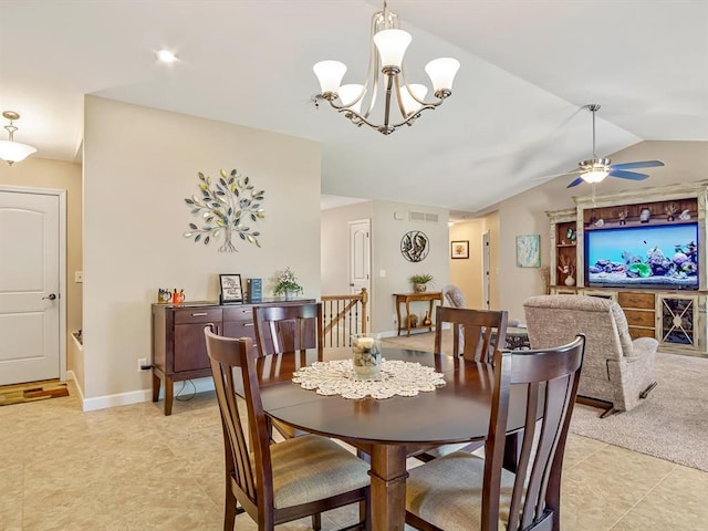 1051 Creekside Dr, Waterloo, IL 62298 - dining space with light tile patterned floors, a chandelier, a ceiling fan, and vaulted ceiling