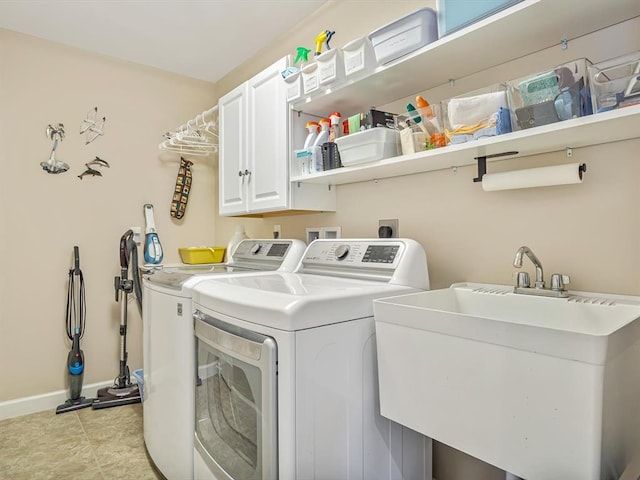 1051 Creekside Dr, Waterloo, IL 62298 - washroom with cabinet space, washer and dryer, and baseboards