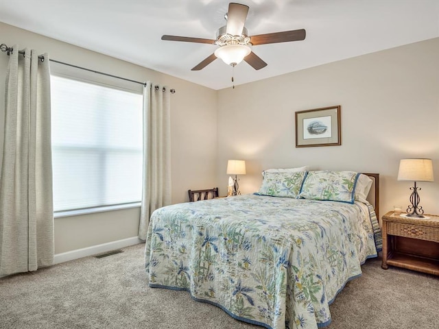 1051 Creekside Dr, Waterloo, IL 62298 - carpeted bedroom featuring baseboards and a ceiling fan