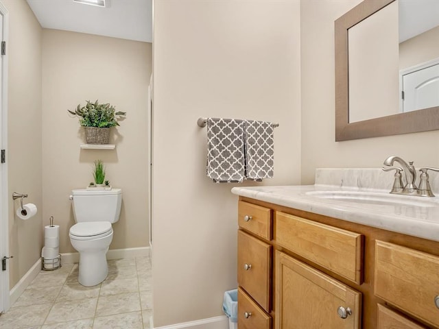 1051 Creekside Dr, Waterloo, IL 62298 - bathroom featuring toilet, baseboards, and vanity
