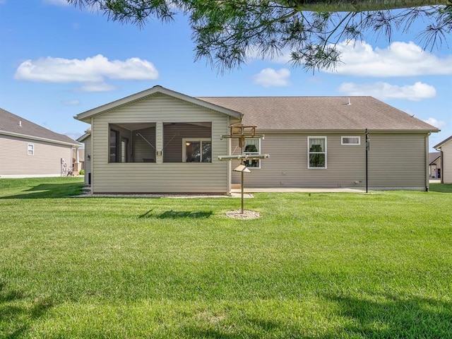 1051 Creekside Dr, Waterloo, IL 62298 - rear view of house with a yard and a patio area