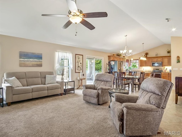 1051 Creekside Dr, Waterloo, IL 62298 - living room featuring a chandelier, lofted ceiling, and a ceiling fan