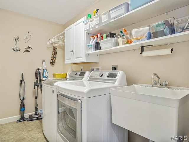 1051 Creekside Dr, Waterloo, IL 62298 - laundry room with cabinet space and independent washer and dryer