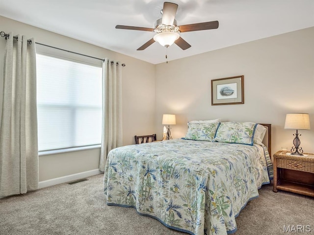 1051 Creekside Dr, Waterloo, IL 62298 - carpeted bedroom with baseboards and ceiling fan