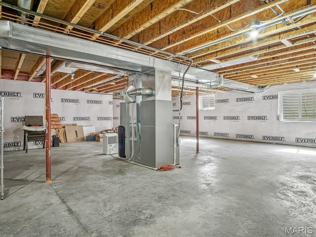 1051 Creekside Dr, Waterloo, IL 62298 - unfinished below grade area featuring heating unit