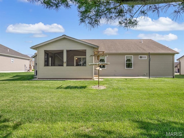 1051 Creekside Dr, Waterloo, IL 62298 - back of property with a yard and a patio