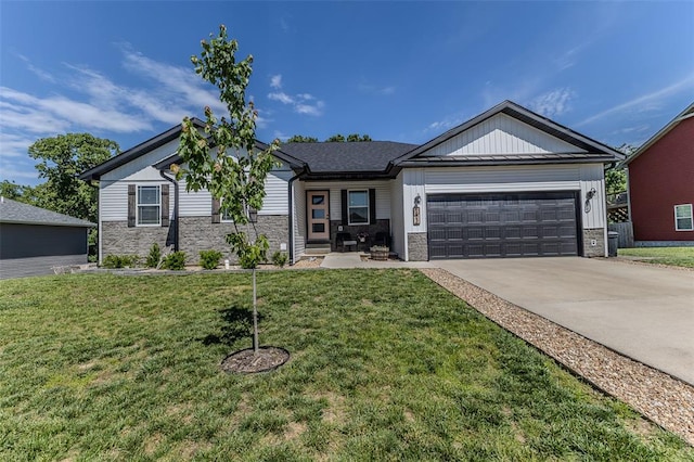 153 Mesa Dr, Waynesville, MO 65583 - view of front facade featuring stone siding, a garage, concrete driveway, and a front lawn