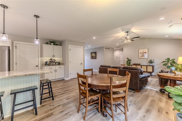 153 Mesa Dr, Waynesville, MO 65583 - dining area with light wood-type flooring, a ceiling fan, vaulted ceiling, baseboards, and recessed lighting