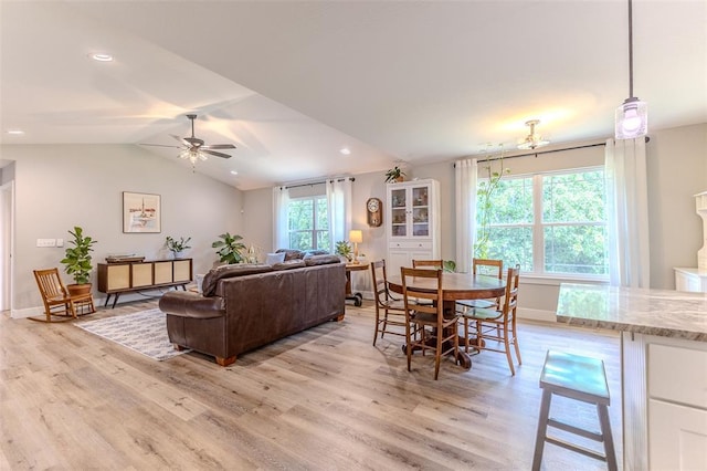 153 Mesa Dr, Waynesville, MO 65583 - living area featuring light wood finished floors, ceiling fan, vaulted ceiling, and baseboards