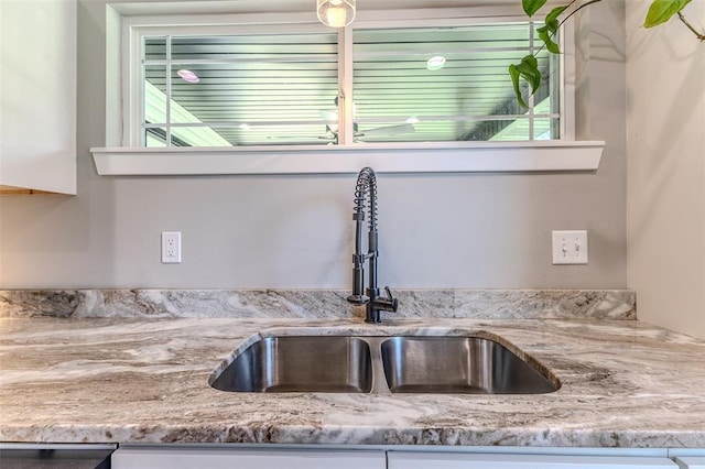 153 Mesa Dr, Waynesville, MO 65583 - kitchen view of a sink and light stone counters