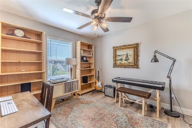 153 Mesa Dr, Waynesville, MO 65583 - office area with ceiling fan, wood finished floors, and baseboards