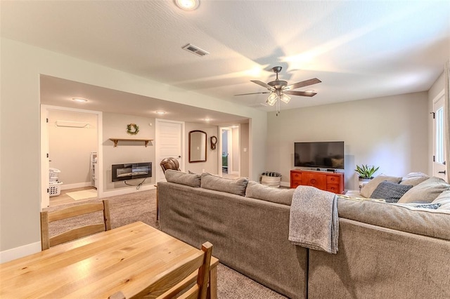 153 Mesa Dr, Waynesville, MO 65583 - carpeted living area with ceiling fan, recessed lighting, and baseboards