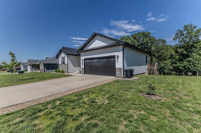 153 Mesa Dr, Waynesville, MO 65583 - single story home with an attached garage, driveway, a front lawn, and stone siding