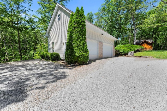 2347 Callaway Fork Rd, Defiance, MO 63341 - view of home's exterior with driveway and a garage