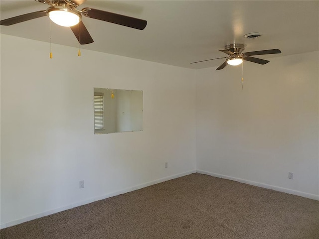 19 Agnes Dr, Cahokia, IL 62206 - spare room featuring a ceiling fan, carpet floors, and baseboards
