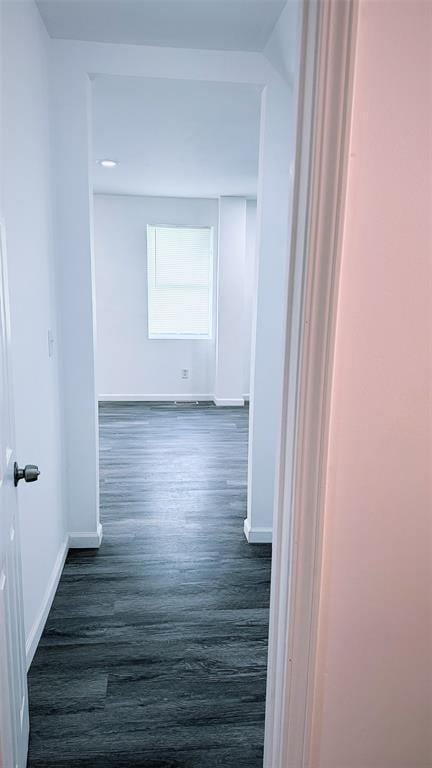 1204 Griefield Pl, Pagedale, MO 63133 - hall featuring baseboards and dark wood-type flooring