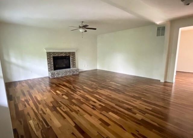 116 Sweet Cherry Way, Grover, MO 63040 - unfurnished living room with wood finished floors, ceiling fan, and a fireplace