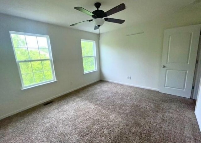 116 Sweet Cherry Way, Grover, MO 63040 - carpeted spare room with baseboards and a ceiling fan