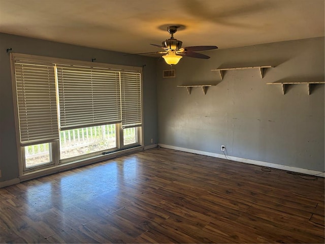 423 Kathryn Dr, Arnold, MO 63010 - empty room featuring wood finished floors, baseboards, and a ceiling fan