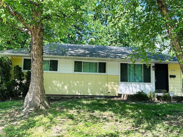 9715 Millburn Dr, Saint Louis, MO 63136 - single story home with a front lawn