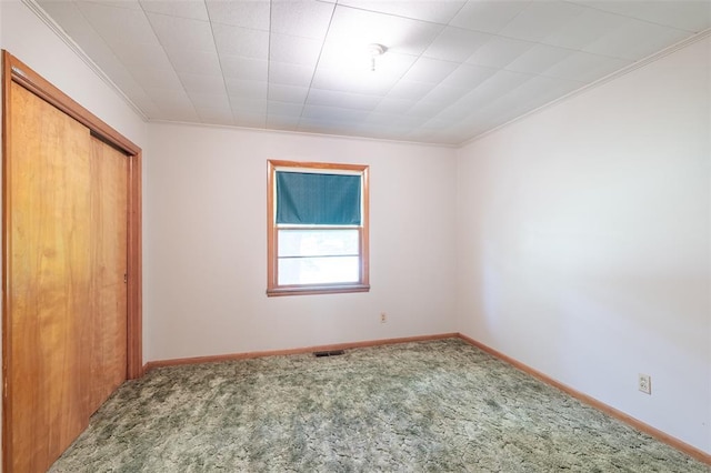 9 Green Meadows Dr, Doniphan, MO 63935 - unfurnished bedroom with carpet, a closet, ornamental molding, and baseboards