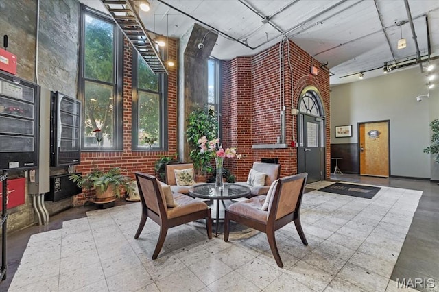 2020 Washington Ave Unit 210, Saint Louis, MO 63103 - lobby featuring a high ceiling and brick wall