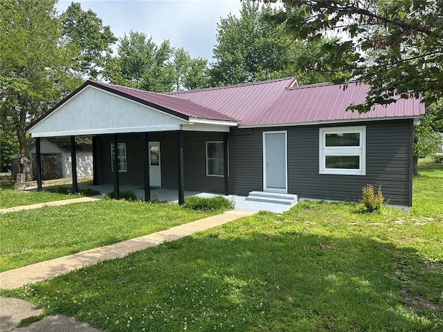 107 W Ruby Ave, Conway, MO 65632 - view of front facade with a front lawn and metal roof
