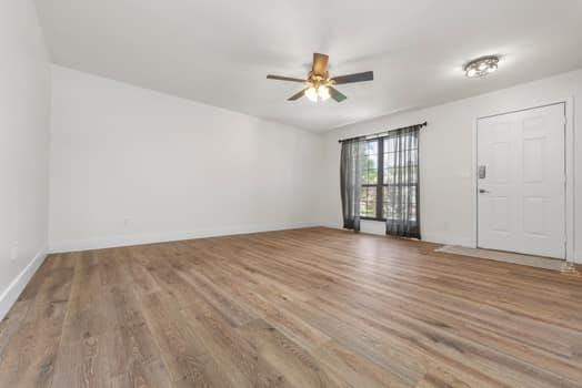 352 Della Dr, Saint Peters, MO 63376 - spare room with a ceiling fan and wood finished floors