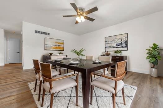 352 Della Dr, Saint Peters, MO 63376 - dining area featuring ceiling fan and wood finished floors